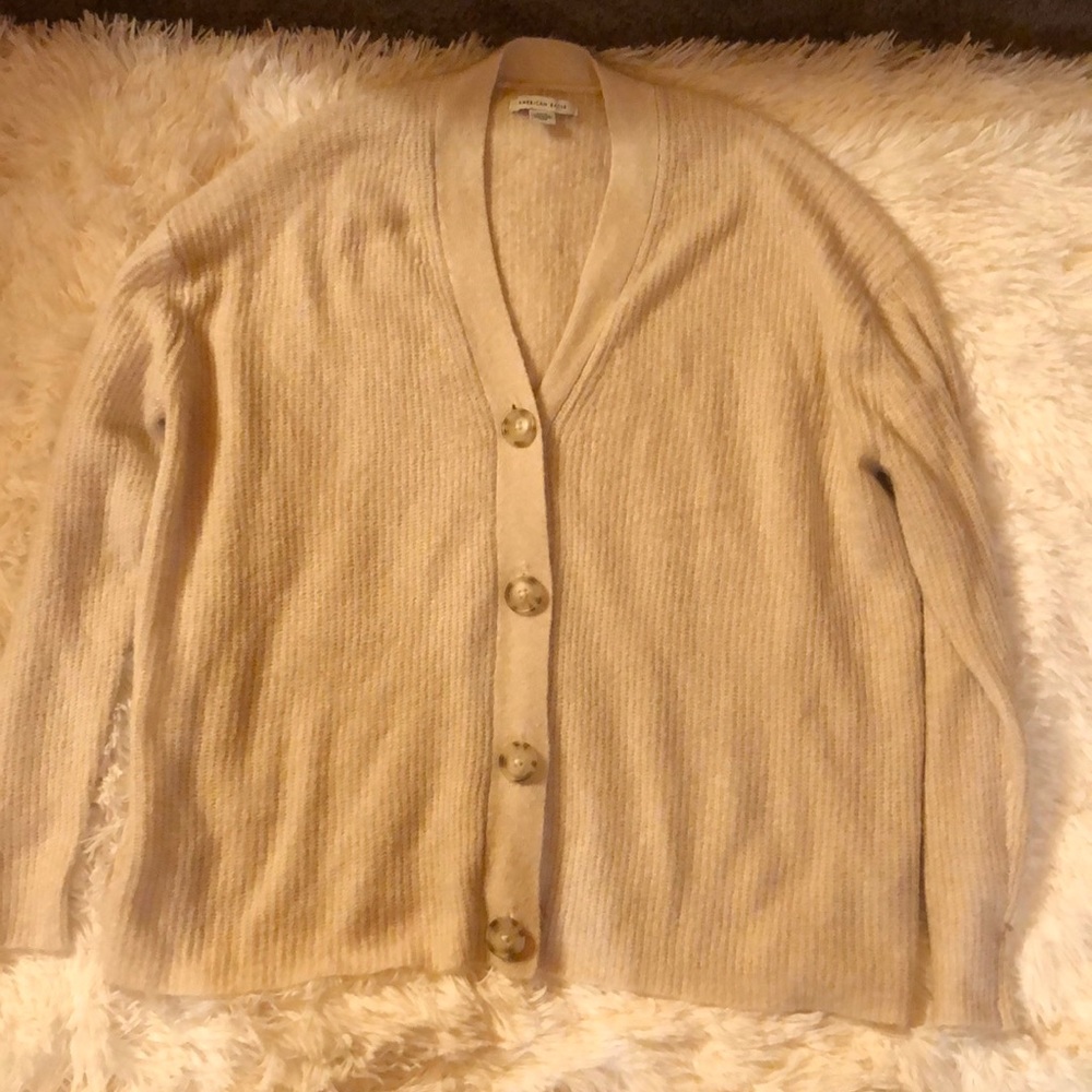 Light pink sweater with buttons